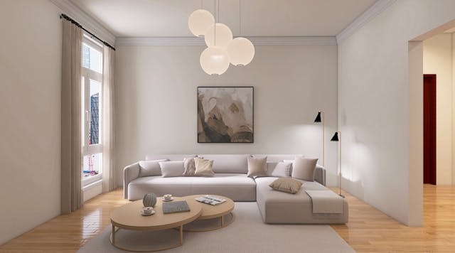 Minimalist living room with beige sectional sofa round wooden tables, and modern pendant lights