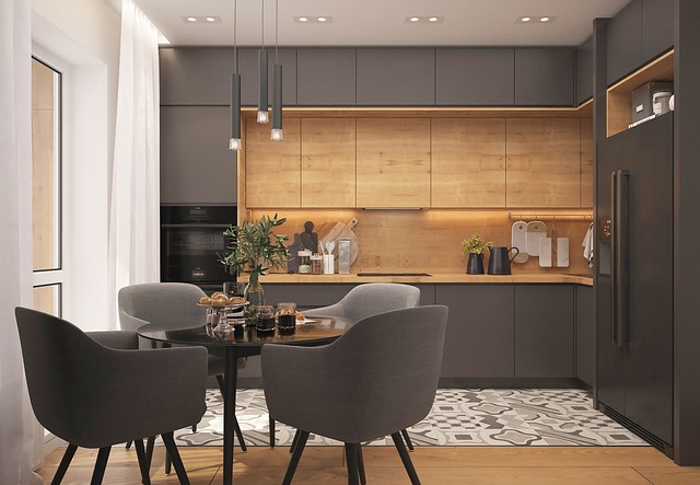 Modern kitchen with dark cabinets and a round dining table